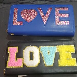 2 pack zip around blue Love sequined and black Love embroidered monogram wallets